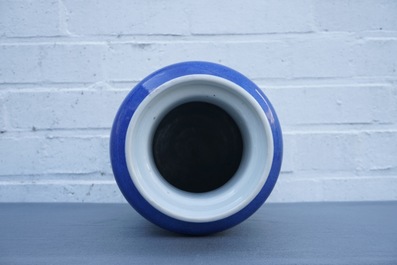 A Chinese monochrome powder blue rouleau vase, Kangxi