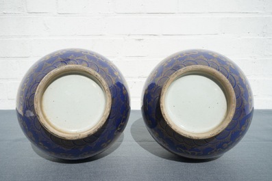 A pair of Chinese monochrome blue vases with gilt dragon design, 19th C.