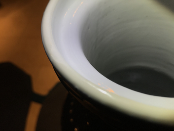A Chinese monochrome powder blue rouleau vase, Kangxi