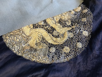 A blue-ground silk coat composed of Imperial Chinese gold thread dragon badges, 19th C.