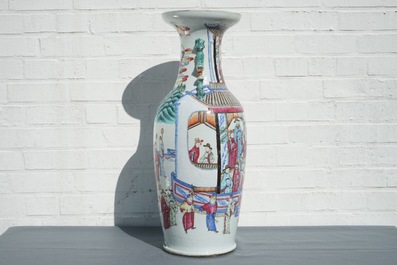 A Chinese famille rose vase with circular court scene design, 19th C.
