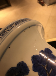 A Chinese blue, white and iron red vase with deer, 19/20th C.