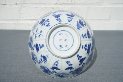 A Chinese blue and white moulded bowl with immortals, Chenghua mark, Kangxi