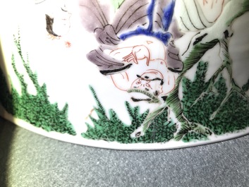 A large Chinese famille verte bowl with figures in a landscape, Kangxi