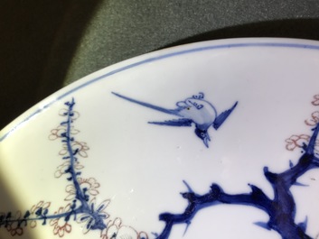 A Chinese blue, white and underglaze red dish, Xuande mark, Kangxi