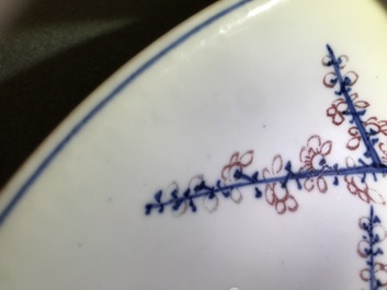 A Chinese blue, white and underglaze red dish, Xuande mark, Kangxi