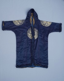 A blue-ground silk coat composed of Imperial Chinese gold thread dragon badges, 19th C.