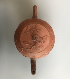 Two Chinese Yixing stoneware teapots with applied floral design, Kangxi