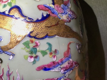 A pair of Chinese famille rose celadon-ground dragon vases, 19th C.
