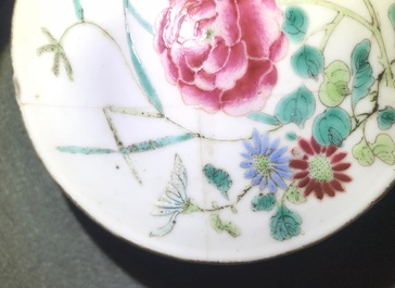 A pair of Chinese famille rose jars and covers with insects and flowers, Qianlong mark, 19/20th C.