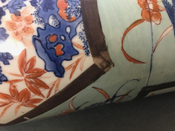 A European-decorated Chinese rouleau vase, Transitional period