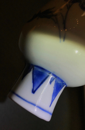 A Chinese blue and white bottle vase with floral design, Transitional period