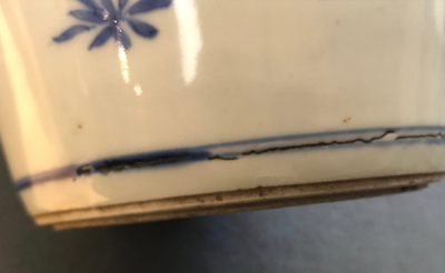 A Chinese blue and white bottle vase with floral design, Transitional period