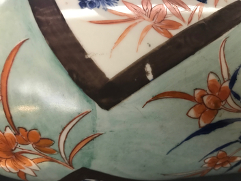 A European-decorated Chinese rouleau vase, Transitional period