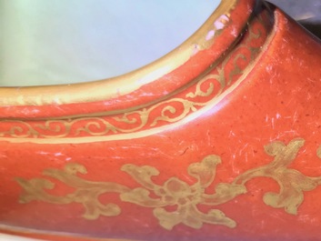 A Chinese coral-ground and gilt miniature shoe with hidden famille rose erotical design, 19/20th C.