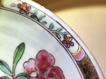 A reticulated double-walled Chinese famille rose cup and saucer, Yongzheng