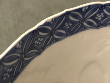 A Chinese blue and white moulded bowl with immortals, Chenghua mark, Kangxi