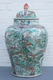 A large Chinese famille verte vase and cover with figures in fluvial landscapes, Kangxi