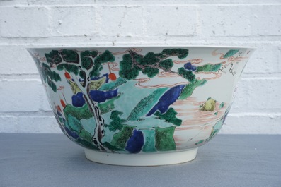 A large Chinese famille verte bowl with figures in a landscape, Kangxi