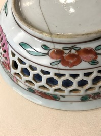 A reticulated double-walled Chinese famille rose cup and saucer, Yongzheng