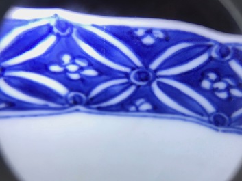 A Chinese blue and white moulded bowl with immortals, Chenghua mark, Kangxi
