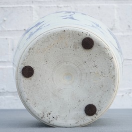 A Chinese blue and white bottle vase with floral design, Transitional period
