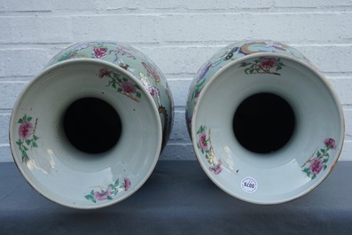 A pair of Chinese famille rose celadon-ground dragon vases, 19th C.