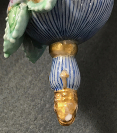 A Chinese parcel-gilt famille rose model of Buddha, 19th C.