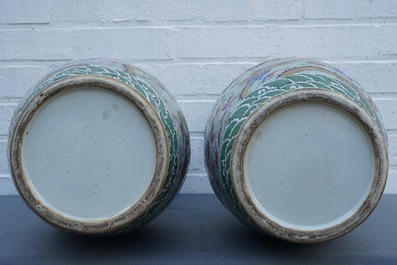 A pair of Chinese famille rose celadon-ground dragon vases, 19th C.