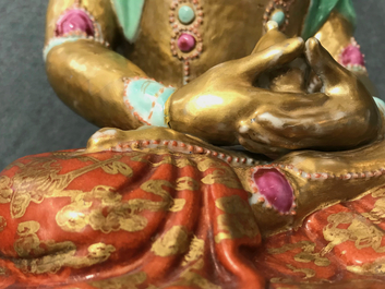 A Chinese parcel-gilt famille rose model of Buddha, 19th C.