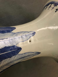 A large Chinese blue and white vase with a lady and calligraphy, 19th C.