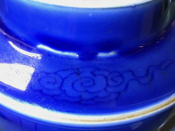 A Chinese monochrome blue tea caddy with underglaze design, Kangxi