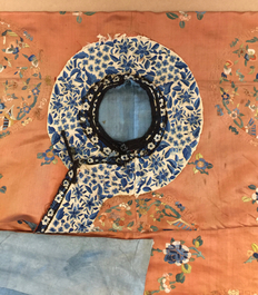 A Chinese orange-ground embroidered silk robe, 19th C.