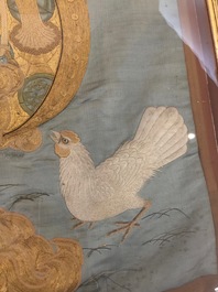A Japanese silk embroidery depicting a rooster on an o-daiko drum, Edo or Meiji, 19th C.