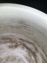 A Chinese cylindrical blanc de Chine Dehua censer on ruyi feet, 19/20th C.