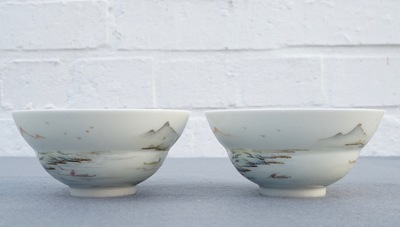 A pair of Chinese famille rose tea bowls with a landscape, Qianlong mark, 20th C.