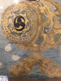 A Japanese silk embroidery depicting a rooster on an o-daiko drum, Edo or Meiji, 19th C.