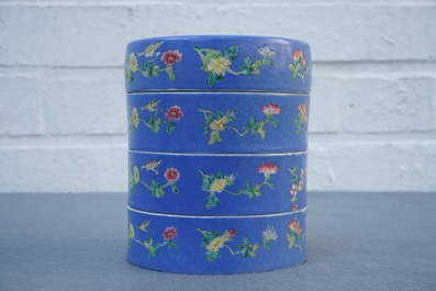 A Chinese blue-ground famille rose four-tier box, Tongzhi mark, 19th C.