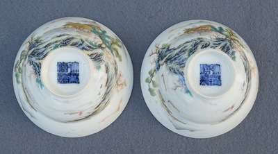 A pair of Chinese famille rose tea bowls with a landscape, Qianlong mark, 20th C.