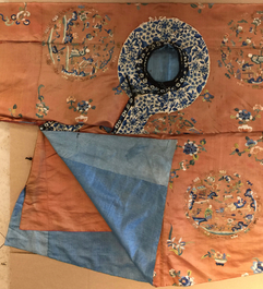 A Chinese orange-ground embroidered silk robe, 19th C.