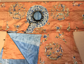 A Chinese orange-ground embroidered silk robe, 19th C.