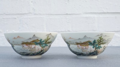 A pair of Chinese famille rose tea bowls with a landscape, Qianlong mark, 20th C.