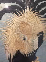 A Japanese silk embroidery depicting a rooster on an o-daiko drum, Edo or Meiji, 19th C.