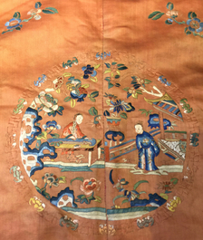 A Chinese orange-ground embroidered silk robe, 19th C.