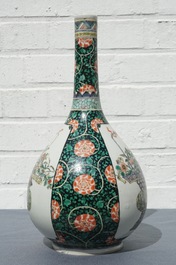 A Chinese famille verte bottle vase with fine flower baskets, 19th C.