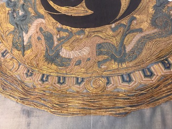 A Japanese silk embroidery depicting a rooster on an o-daiko drum, Edo or Meiji, 19th C.