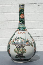 A Chinese famille verte bottle vase with fine flower baskets, 19th C.