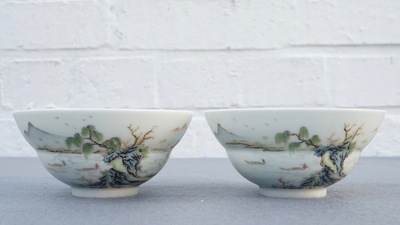 A pair of Chinese famille rose tea bowls with a landscape, Qianlong mark, 20th C.