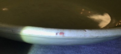 A massive Chinese Longquan celadon dish with underglaze design, Ming