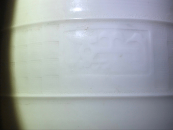 A Chinese cylindrical blanc de Chine Dehua censer on ruyi feet, 19/20th C.